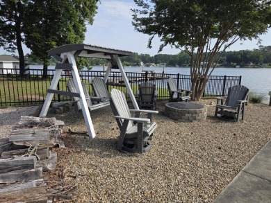 Deepwater lakefront home at Taw Caw Creek on Lake Marione view on Foxboro Golf Club in South Carolina - for sale on GolfHomes.com, golf home, golf lot