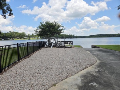 Deepwater lakefront home at Taw Caw Creek on Lake Marione view on Foxboro Golf Club in South Carolina - for sale on GolfHomes.com, golf home, golf lot