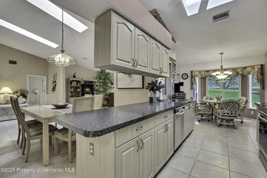 Welcome to this bright and spacious Oakmont villa located in the on Timber Pines Golf Course in Florida - for sale on GolfHomes.com, golf home, golf lot