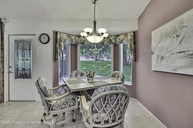 Welcome to this bright and spacious Oakmont villa located in the on Timber Pines Golf Course in Florida - for sale on GolfHomes.com, golf home, golf lot