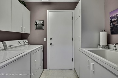 Welcome to this bright and spacious Oakmont villa located in the on Timber Pines Golf Course in Florida - for sale on GolfHomes.com, golf home, golf lot