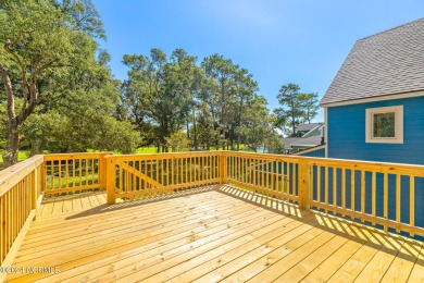 This spacious beach house offers extensive modern updates with on Oak Island Golf Club in North Carolina - for sale on GolfHomes.com, golf home, golf lot