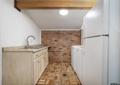 Experience the allure of this updated Mid Century Modern gem on Eagles Bluff Golf Course in Texas - for sale on GolfHomes.com, golf home, golf lot