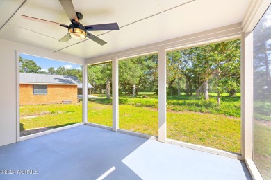 This spacious beach house offers extensive modern updates with on Oak Island Golf Club in North Carolina - for sale on GolfHomes.com, golf home, golf lot