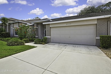 Welcome to this bright and spacious Oakmont villa located in the on Timber Pines Golf Course in Florida - for sale on GolfHomes.com, golf home, golf lot
