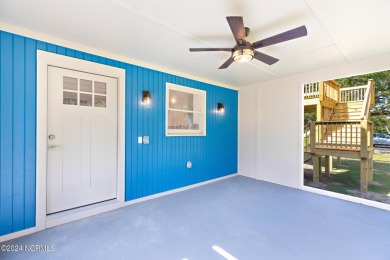 This spacious beach house offers extensive modern updates with on Oak Island Golf Club in North Carolina - for sale on GolfHomes.com, golf home, golf lot