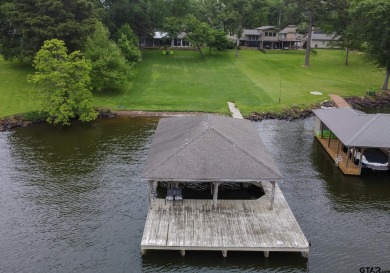 Experience the allure of this updated Mid Century Modern gem on Eagles Bluff Golf Course in Texas - for sale on GolfHomes.com, golf home, golf lot