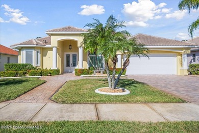 Step into this beautifully maintained pool home in the coveted on Viera East Golf Club in Florida - for sale on GolfHomes.com, golf home, golf lot