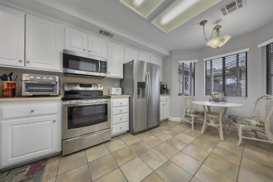 Step into this charming, brilliantly designed 2-bedroom on The Lakes Country Club in California - for sale on GolfHomes.com, golf home, golf lot