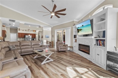 Step into timeless Florida living in this spacious and move in on Heritage Isles Golf and Country Club in Florida - for sale on GolfHomes.com, golf home, golf lot