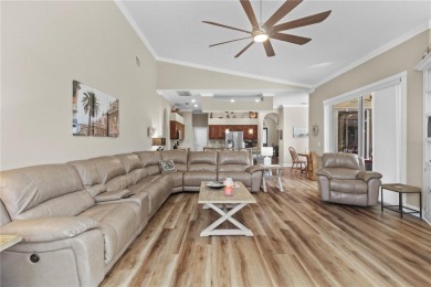 Step into timeless Florida living in this spacious and move in on Heritage Isles Golf and Country Club in Florida - for sale on GolfHomes.com, golf home, golf lot