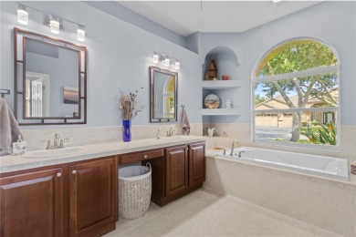 Step into timeless Florida living in this spacious and move in on Heritage Isles Golf and Country Club in Florida - for sale on GolfHomes.com, golf home, golf lot
