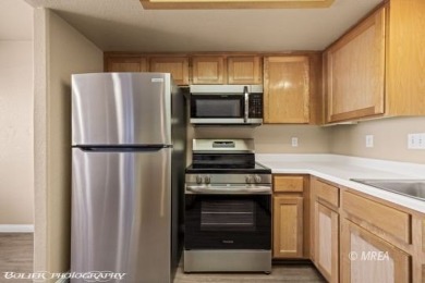 Don't miss out on 334 Colleen Ct #D!  This ground floor condo on The Oasis Golf Club in Nevada - for sale on GolfHomes.com, golf home, golf lot