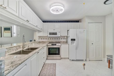 UPDATED KITCHEN WITH QUARTZ COUNTERS, IMPACT WINDOWS AND SLIDERS on Royal Wood Golf and Country Club in Florida - for sale on GolfHomes.com, golf home, golf lot