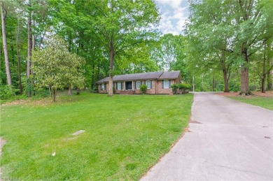 Nestled in Colonial Country Club, this beautiful home combines on Colonial Country Club in North Carolina - for sale on GolfHomes.com, golf home, golf lot