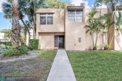 This spacious 3-bedroom, 2.5-bathroom corner unit townhome is on Pine Island Ridge Country Club in Florida - for sale on GolfHomes.com, golf home, golf lot