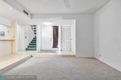 This spacious 3-bedroom, 2.5-bathroom corner unit townhome is on Pine Island Ridge Country Club in Florida - for sale on GolfHomes.com, golf home, golf lot