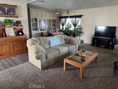 Welcome to your dream home in a vibrant 55+ golf community! This on Colonial Country Club in California - for sale on GolfHomes.com, golf home, golf lot