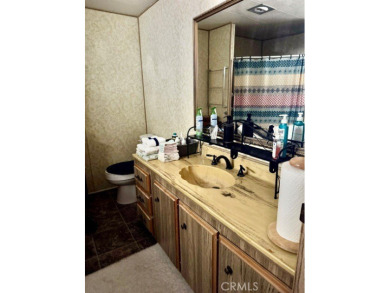 Welcome to your dream home in a vibrant 55+ golf community! This on Colonial Country Club in California - for sale on GolfHomes.com, golf home, golf lot