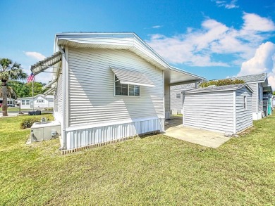**For Sale: Charming Furnished Single Wide Home in a Vibrant 55+ on Lily Lake Golf and RV Resort in Florida - for sale on GolfHomes.com, golf home, golf lot