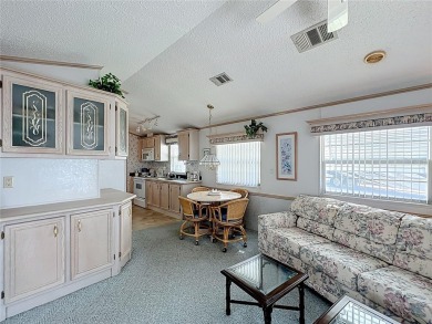 **For Sale: Charming Furnished Single Wide Home in a Vibrant 55+ on Lily Lake Golf and RV Resort in Florida - for sale on GolfHomes.com, golf home, golf lot