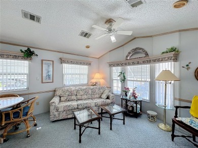 **For Sale: Charming Furnished Single Wide Home in a Vibrant 55+ on Lily Lake Golf and RV Resort in Florida - for sale on GolfHomes.com, golf home, golf lot