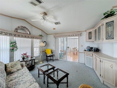 **For Sale: Charming Furnished Single Wide Home in a Vibrant 55+ on Lily Lake Golf and RV Resort in Florida - for sale on GolfHomes.com, golf home, golf lot