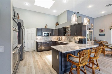 Sought-After Callaway Place in Prestigious PGA Village! You will on The Legacy Golf and Tennis Club in Florida - for sale on GolfHomes.com, golf home, golf lot