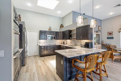 Sought-After Callaway Place in Prestigious PGA Village! You will on The Legacy Golf and Tennis Club in Florida - for sale on GolfHomes.com, golf home, golf lot