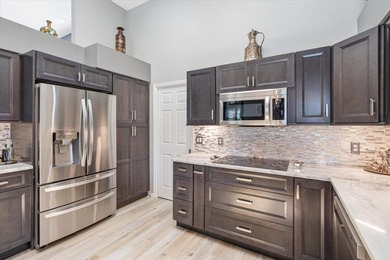 Sought-After Callaway Place in Prestigious PGA Village! You will on The Legacy Golf and Tennis Club in Florida - for sale on GolfHomes.com, golf home, golf lot