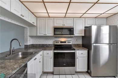 Bring your buyers to this very well maintained condo in Phase 4 on Sunrise Lakes Phase IV Golf Course in Florida - for sale on GolfHomes.com, golf home, golf lot