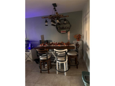 This beautifully remodeled 2 bedroom 2 bath condo is located in on Sunrise Lakes Phase IV Golf Course in Florida - for sale on GolfHomes.com, golf home, golf lot
