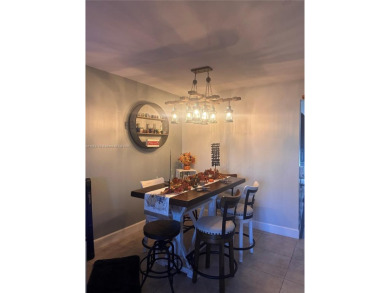 This beautifully remodeled 2 bedroom 2 bath condo is located in on Sunrise Lakes Phase IV Golf Course in Florida - for sale on GolfHomes.com, golf home, golf lot