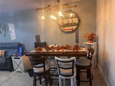 This beautifully remodeled 2 bedroom 2 bath condo is located in on Sunrise Lakes Phase IV Golf Course in Florida - for sale on GolfHomes.com, golf home, golf lot
