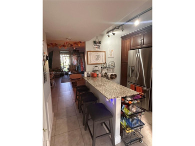 This beautifully remodeled 2 bedroom 2 bath condo is located in on Sunrise Lakes Phase IV Golf Course in Florida - for sale on GolfHomes.com, golf home, golf lot