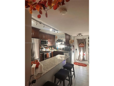 This beautifully remodeled 2 bedroom 2 bath condo is located in on Sunrise Lakes Phase IV Golf Course in Florida - for sale on GolfHomes.com, golf home, golf lot