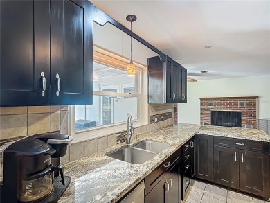 Amazing Pool home on 1 acre with complete outside kitchen by on Indian Lake Estates Golf and Country Club in Florida - for sale on GolfHomes.com, golf home, golf lot