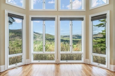 Perched high above Sapphire Valley, this stunning mountain on The Country Club of Sapphire Valley in North Carolina - for sale on GolfHomes.com, golf home, golf lot