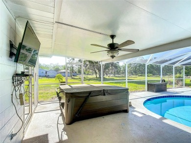Amazing Pool home on 1 acre with complete outside kitchen by on Indian Lake Estates Golf and Country Club in Florida - for sale on GolfHomes.com, golf home, golf lot