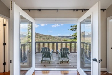 Perched high above Sapphire Valley, this stunning mountain on The Country Club of Sapphire Valley in North Carolina - for sale on GolfHomes.com, golf home, golf lot