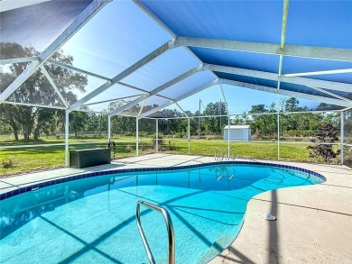 Amazing Pool home on 1 acre with complete outside kitchen by on Indian Lake Estates Golf and Country Club in Florida - for sale on GolfHomes.com, golf home, golf lot