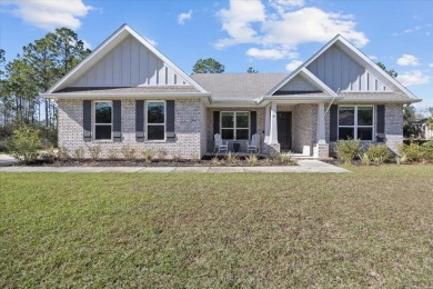 Discover a home that combines modern luxury, ample space, and an on Windswept Dunes Golf Club in Florida - for sale on GolfHomes.com, golf home, golf lot