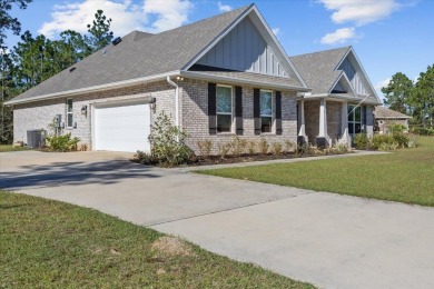 Discover a home that combines modern luxury, ample space, and an on Windswept Dunes Golf Club in Florida - for sale on GolfHomes.com, golf home, golf lot