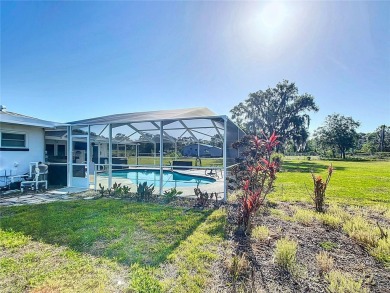 Amazing Pool home on 1 acre with complete outside kitchen by on Indian Lake Estates Golf and Country Club in Florida - for sale on GolfHomes.com, golf home, golf lot