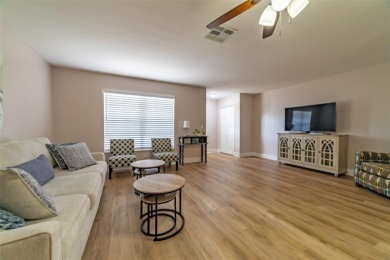 Welcome to this charming and move-in ready home in Sun City on Caloosa Greens Executive Golf Course in Florida - for sale on GolfHomes.com, golf home, golf lot