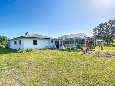 Amazing Pool home on 1 acre with complete outside kitchen by on Indian Lake Estates Golf and Country Club in Florida - for sale on GolfHomes.com, golf home, golf lot