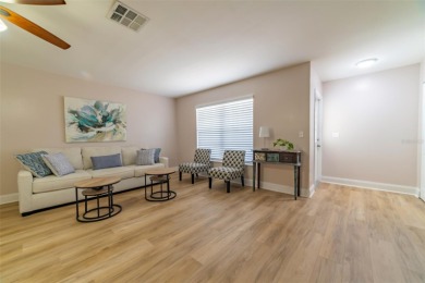 Welcome to this charming and move-in ready home in Sun City on Caloosa Greens Executive Golf Course in Florida - for sale on GolfHomes.com, golf home, golf lot
