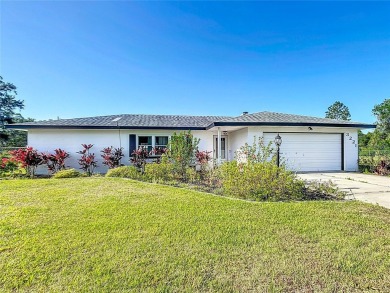 Amazing Pool home on 1 acre with complete outside kitchen by on Indian Lake Estates Golf and Country Club in Florida - for sale on GolfHomes.com, golf home, golf lot