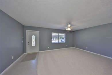 One or more photo(s) has been virtually staged. UPDATED AND on Kings Point Executive Golf Course in Florida - for sale on GolfHomes.com, golf home, golf lot