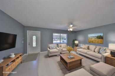 One or more photo(s) has been virtually staged. UPDATED AND on Kings Point Executive Golf Course in Florida - for sale on GolfHomes.com, golf home, golf lot